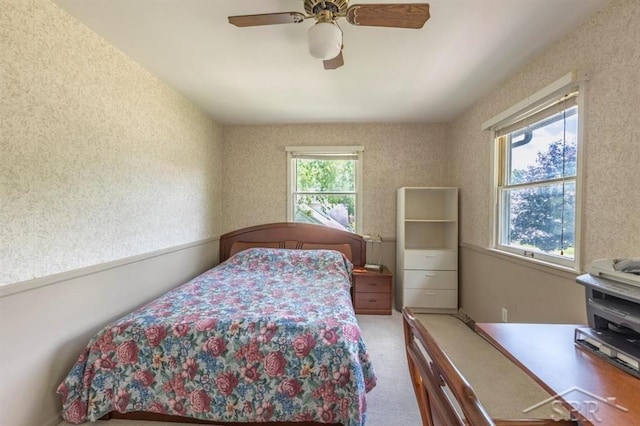 595 Stoneham Rd, Saginaw, MI 48638 - bedroom with ceiling fan and carpet