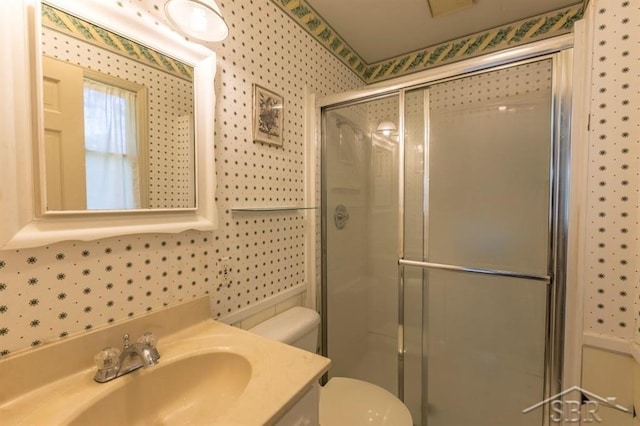 595 Stoneham Rd, Saginaw, MI 48638 - full bathroom with wallpapered walls, a stall shower, and vanity