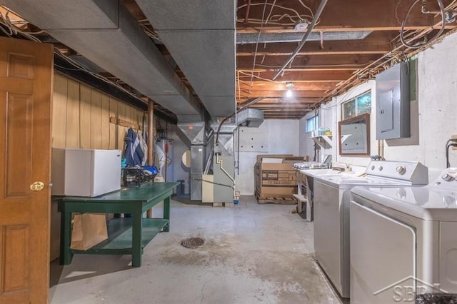 595 Stoneham Rd, Saginaw, MI 48638 - below grade area with electric panel, heating unit, washing machine and dryer, and water heater