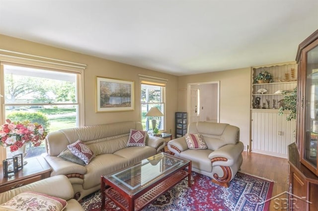 595 Stoneham Rd, Saginaw, MI 48638 - living room featuring healthy amount of natural light and wood finished floors