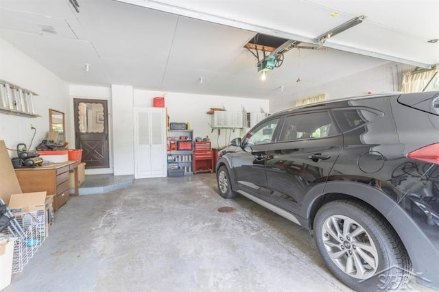 595 Stoneham Rd, Saginaw, MI 48638 - garage with a garage door opener