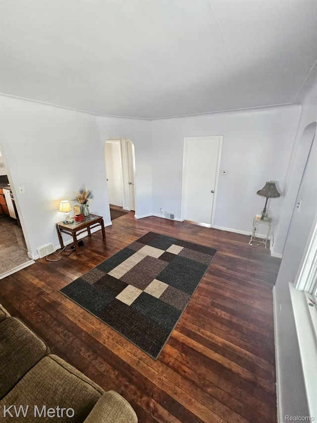 4010 Stolzenfeld Ave, Warren, MI 48091 - living area with arched walkways and hardwood / wood-style floors