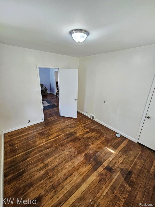 4010 Stolzenfeld Ave, Warren, MI 48091 - spare room featuring hardwood / wood-style floors and baseboards