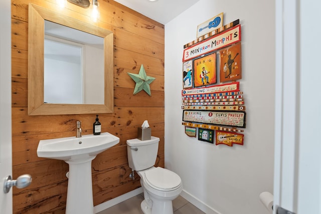 15337 Pardee Rd, Galien, MI 49113 - half bathroom featuring wood walls and tile patterned floors