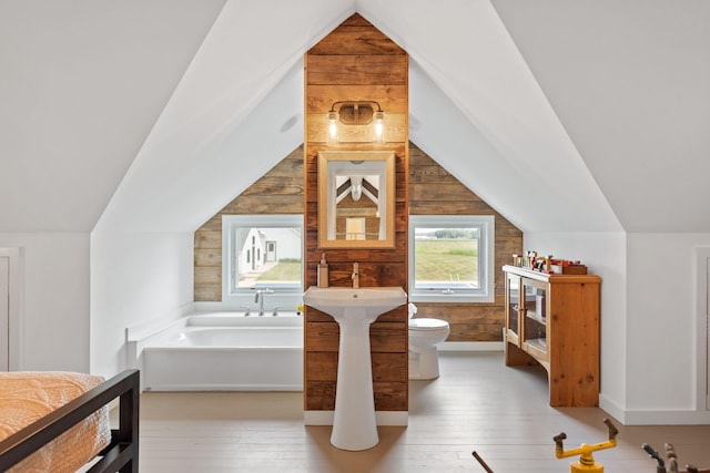 15337 Pardee Rd, Galien, MI 49113 - full bath featuring vaulted ceiling, hardwood / wood-style flooring, wood walls, and a garden tub