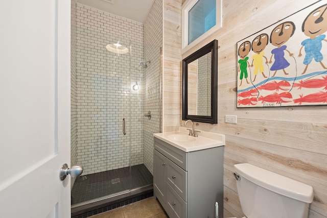 15337 Pardee Rd, Galien, MI 49113 - bathroom featuring a stall shower, vanity, wood walls, and tile patterned flooring
