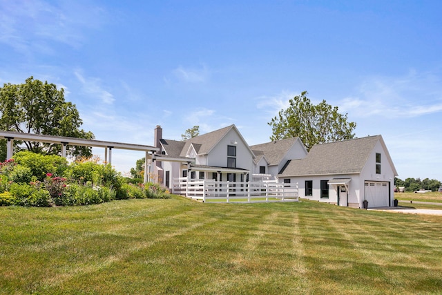 15337 Pardee Rd, Galien, MI 49113 - rear view of house featuring a chimney, roof with shingles, and stucco siding
