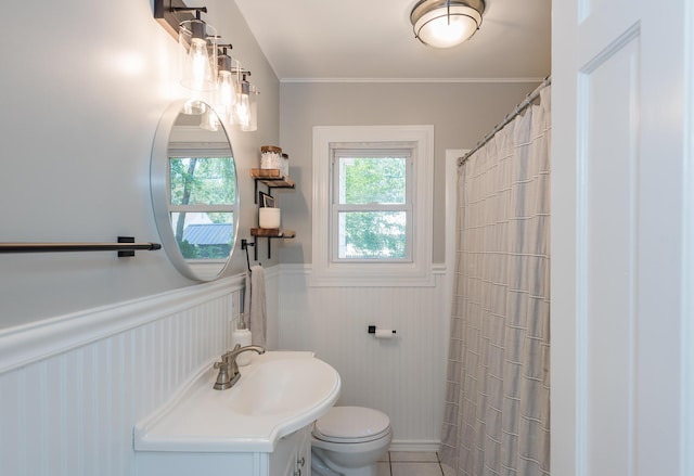 2931 Eastland Rd, Muskegon, MI 49441 - bathroom featuring wainscoting, healthy amount of natural light, and a shower with shower curtain