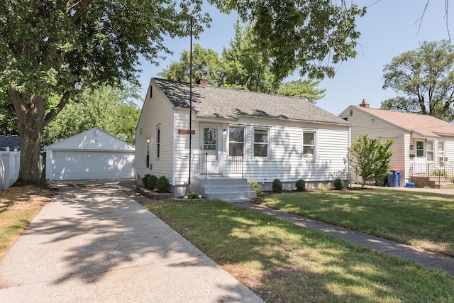 2931 Eastland Rd, Muskegon, MI 49441 - view of front of home featuring an outdoor structure, a garage, a shingled roof, and a chimney
