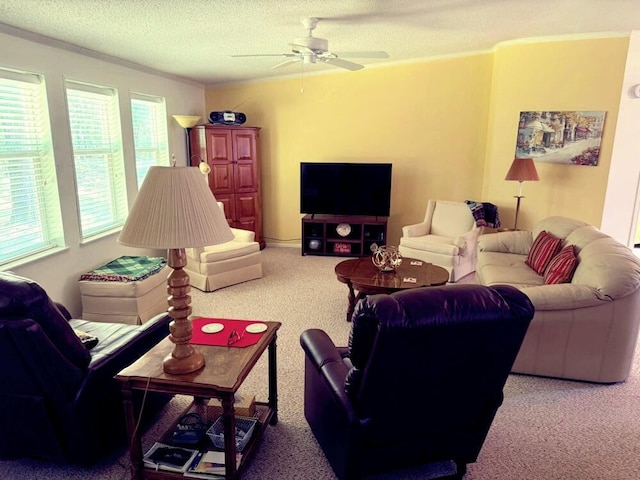 7878 Schooner Ln, Canadian Lakes, MI 49346 - carpeted living room featuring crown molding, a textured ceiling, and a ceiling fan
