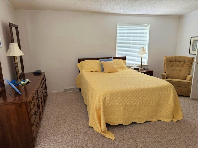 7878 Schooner Ln, Canadian Lakes, MI 49346 - bedroom featuring light carpet, a textured ceiling, and ornamental molding