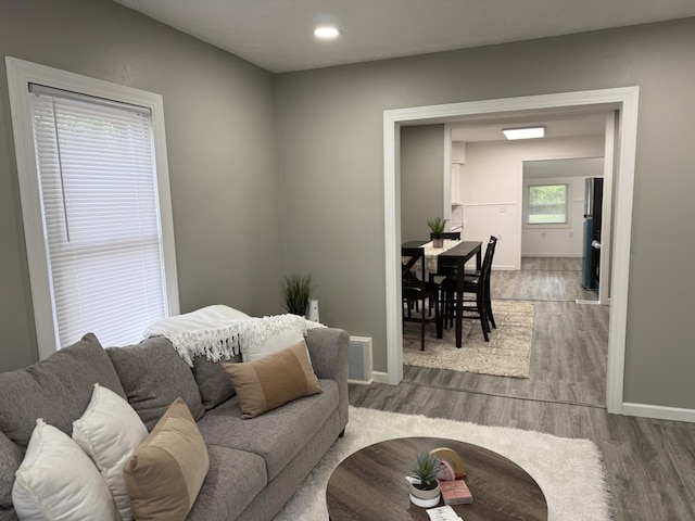 1008 Cooper Ave, Kalamazoo, MI 49048 - living room featuring wood finished floors and recessed lighting