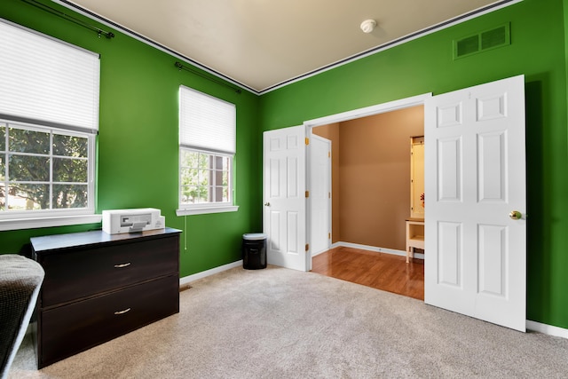 5196 Mesa Dr, Michigan, MI 48316 - carpeted bedroom featuring crown molding and a desk