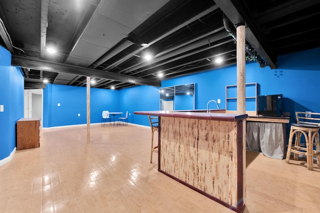 5196 Mesa Dr, Michigan, MI 48316 - indoor wet bar featuring wood finished floors and baseboards