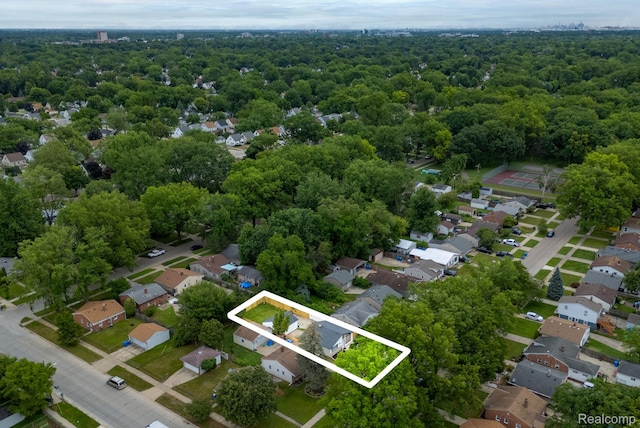 25288 Hopkins St, Dearborn Heights, MI 48125 - aerial view of residential area featuring property parcel outlined and a forest