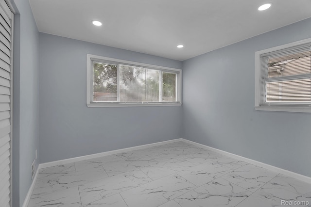 25288 Hopkins St, Dearborn Heights, MI 48125 - empty room featuring marble finish flooring and recessed lighting
