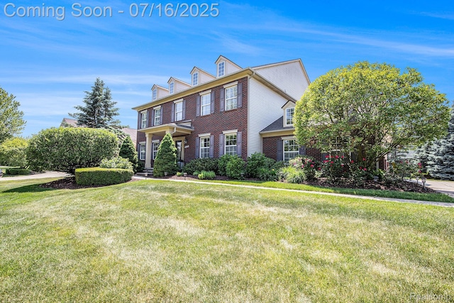 4190 Derry Ct, Oakland, MI 48306 - view of front of home with brick siding and a front yard