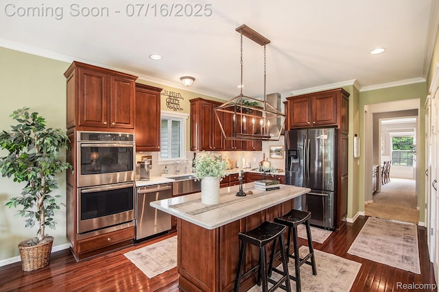 4190 Derry Ct, Oakland, MI 48306 - kitchen with stainless steel appliances, dark wood-type flooring, a breakfast bar, backsplash, and a kitchen island
