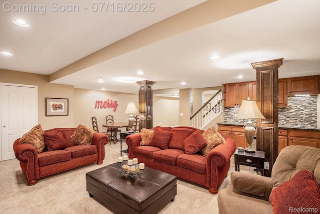 4190 Derry Ct, Oakland, MI 48306 - living room featuring light carpet, recessed lighting, decorative columns, and stairs