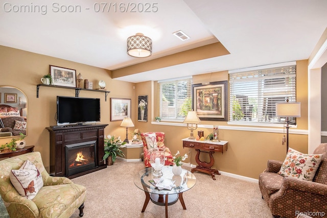 4190 Derry Ct, Oakland, MI 48306 - living room with carpet flooring, healthy amount of natural light, and a glass covered fireplace