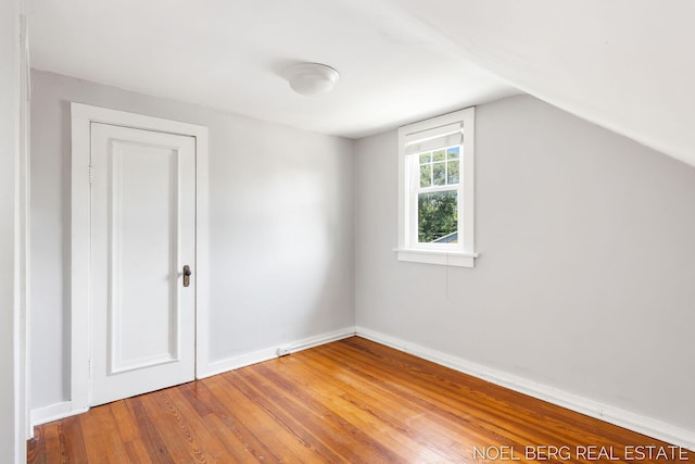 1307 Waverly Ave, Grand Haven, MI 49417 - bonus room featuring wood finished floors and lofted ceiling
