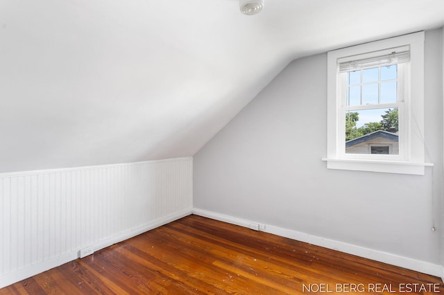 1307 Waverly Ave, Grand Haven, MI 49417 - additional living space featuring hardwood / wood-style floors and lofted ceiling