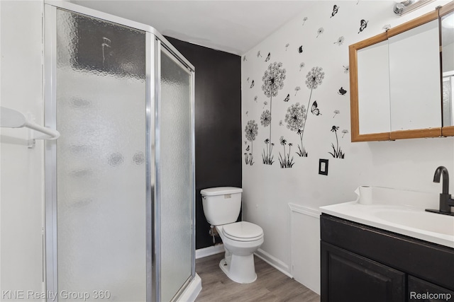 25143 Fern St, Roseville, MI 48066 - full bath featuring a stall shower, wood finished floors, and vanity
