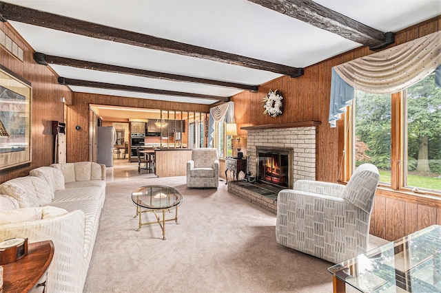 4213 Wentworth Dr, Troy, MI 48098 - living area featuring wooden walls, beamed ceiling, a fireplace, and light colored carpet
