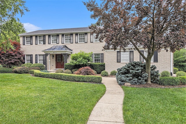 4213 Wentworth Dr, Troy, MI 48098 - colonial inspired home with a front yard and brick siding