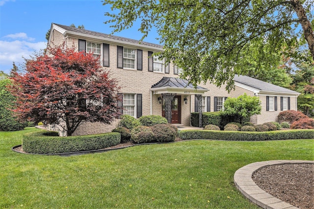 4213 Wentworth Dr, Troy, MI 48098 - view of front of home with a front lawn and brick siding