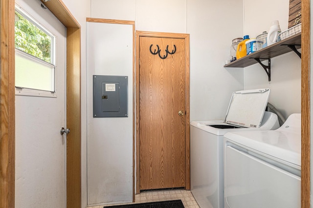 6671 E 136th St, Sand Lake, MI 49343 - laundry area featuring electric panel and washing machine and clothes dryer