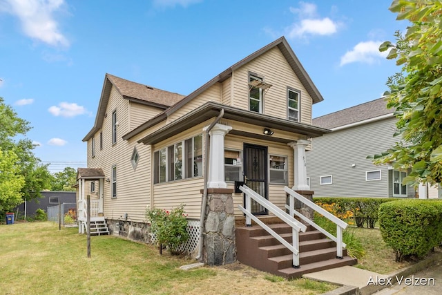 510 La Grave Ave SE, Grand Rapids, MI 49503 - view of front of home with a front lawn and a shingled roof