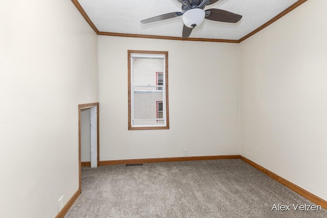 510 La Grave Ave SE, Grand Rapids, MI 49503 - carpeted spare room featuring crown molding and a ceiling fan