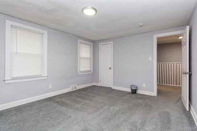 3602 Chatsworth St, Detroit, MI 48224 - unfurnished bedroom with dark carpet and a closet