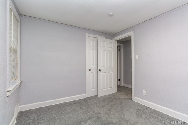 3602 Chatsworth St, Detroit, MI 48224 - unfurnished bedroom featuring carpet floors and baseboards
