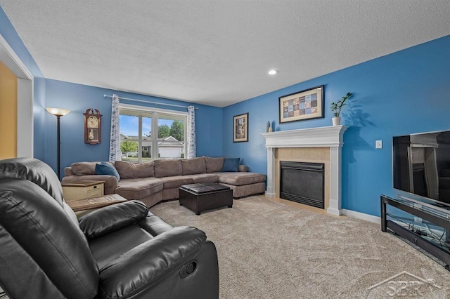 936 Appaloosa Pass, Auburn, MI 48611 - carpeted living room with a fireplace, a textured ceiling, and recessed lighting