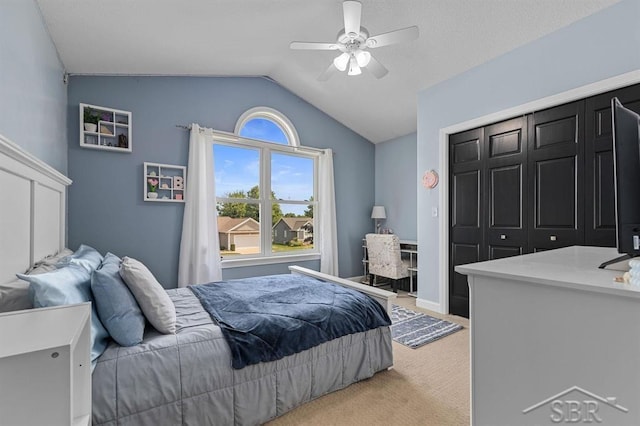 936 Appaloosa Pass, Auburn, MI 48611 - bedroom featuring light carpet, lofted ceiling, ceiling fan, and a closet