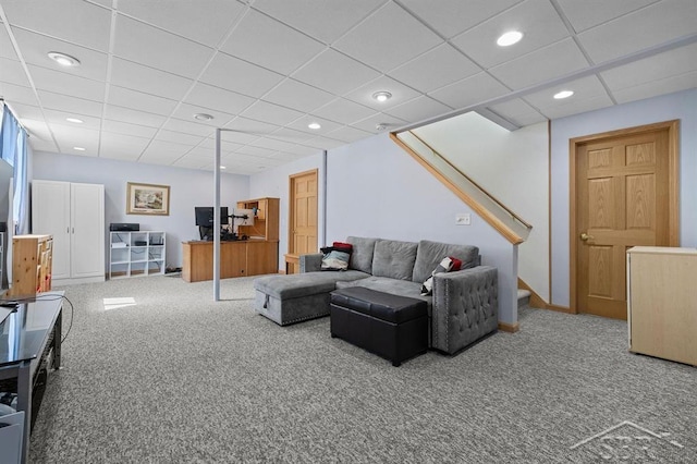 936 Appaloosa Pass, Auburn, MI 48611 - carpeted living room with a drop ceiling, stairway, and recessed lighting