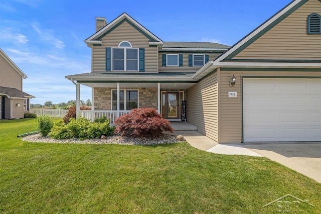 936 Appaloosa Pass, Auburn, MI 48611 - traditional-style house with a chimney, a front yard, covered porch, and stone siding