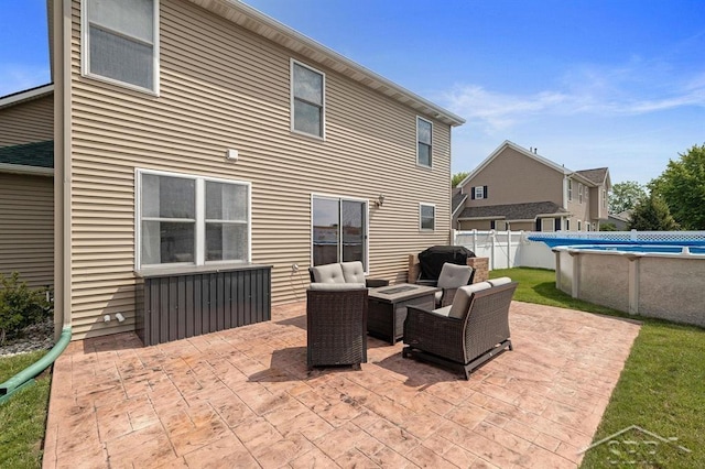 936 Appaloosa Pass, Auburn, MI 48611 - view of patio featuring an outdoor hangout area