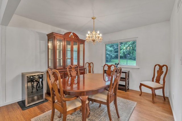 2840 Tuebingen Pkwy, Ann Arbor, MI 48105 - dining room with light wood-style floors and a chandelier