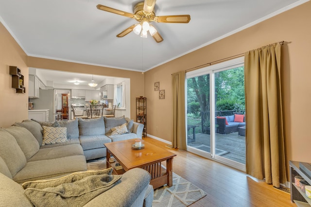 2840 Tuebingen Pkwy, Ann Arbor, MI 48105 - living area featuring light wood-type flooring, a ceiling fan, and crown molding