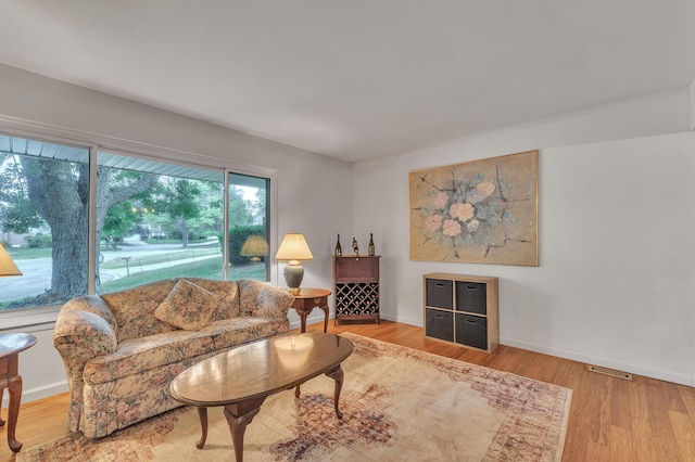 2840 Tuebingen Pkwy, Ann Arbor, MI 48105 - living area with baseboards and wood finished floors