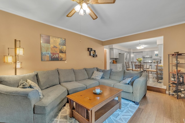 2840 Tuebingen Pkwy, Ann Arbor, MI 48105 - living room with a ceiling fan, light wood-type flooring, and ornamental molding