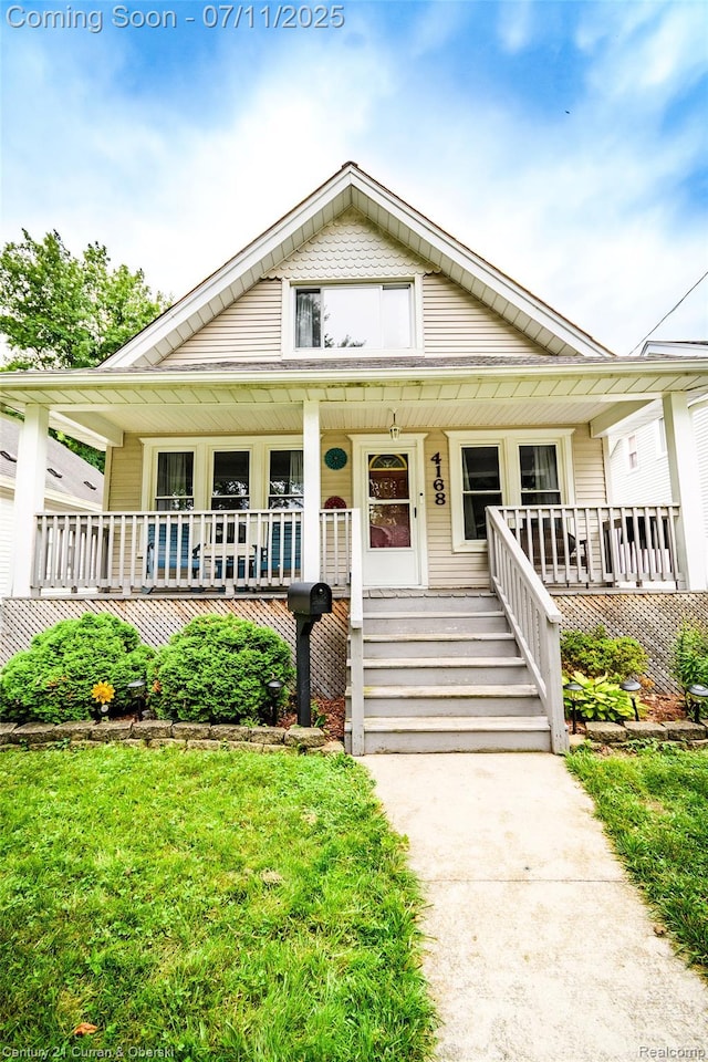 4168 Polk St, Dearborn Heights, MI 48125 - bungalow-style house featuring a porch