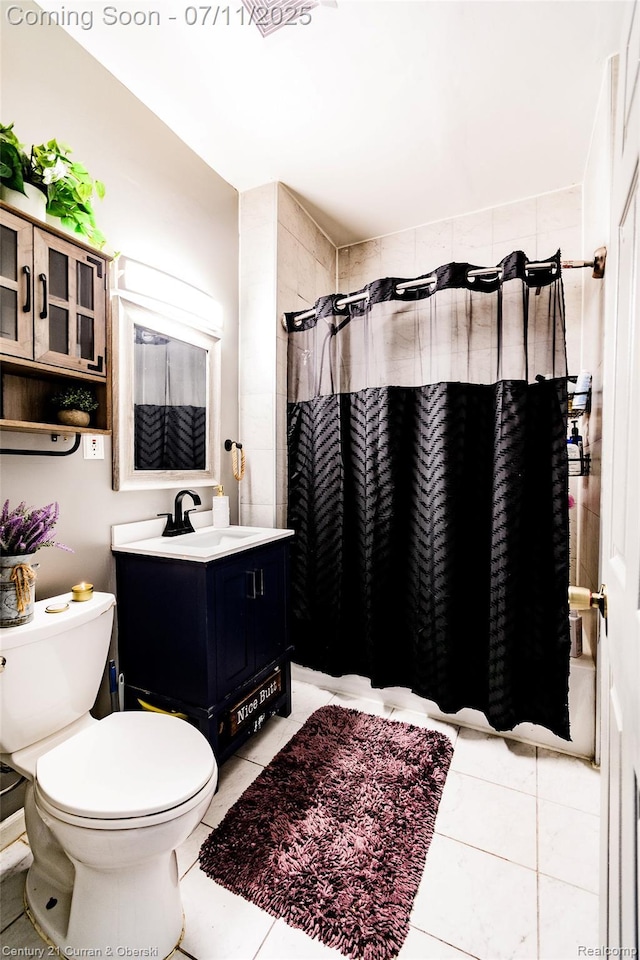 4168 Polk St, Dearborn Heights, MI 48125 - full bath featuring tiled shower, vanity, and tile patterned floors