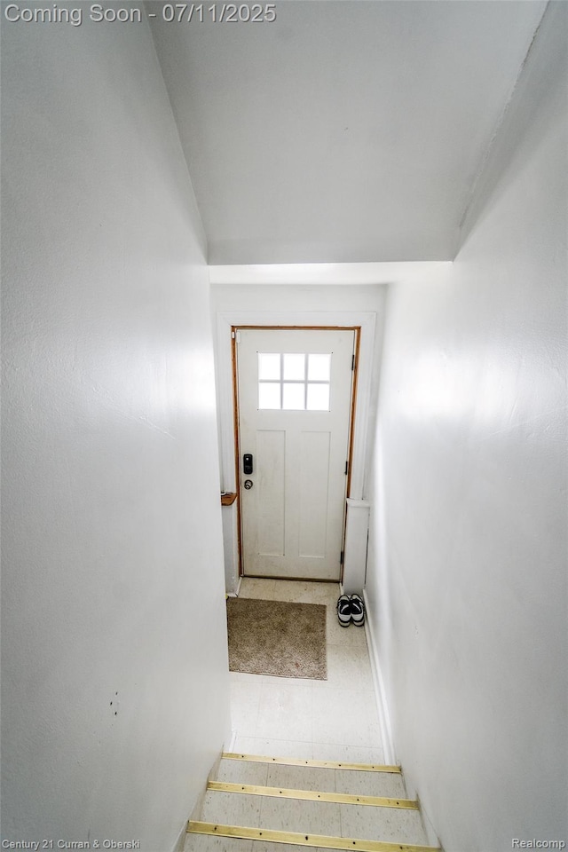 4168 Polk St, Dearborn Heights, MI 48125 - doorway to outside with baseboards and tile patterned flooring
