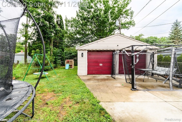 4168 Polk St, Dearborn Heights, MI 48125 - detached garage with a trampoline