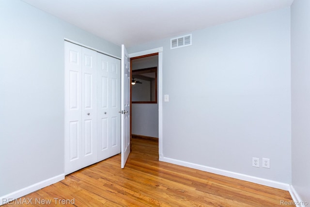 30604 Ann Arbor Trl, Westland, MI 48185 - unfurnished bedroom with light wood-style floors and a closet