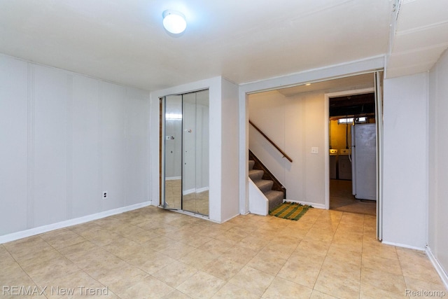 30604 Ann Arbor Trl, Westland, MI 48185 - spare room with stairs and baseboards